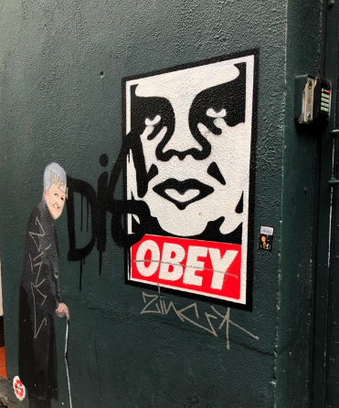 Dublin Team Building Street Art Walk — participants checking the live leaderboard in Smithfield