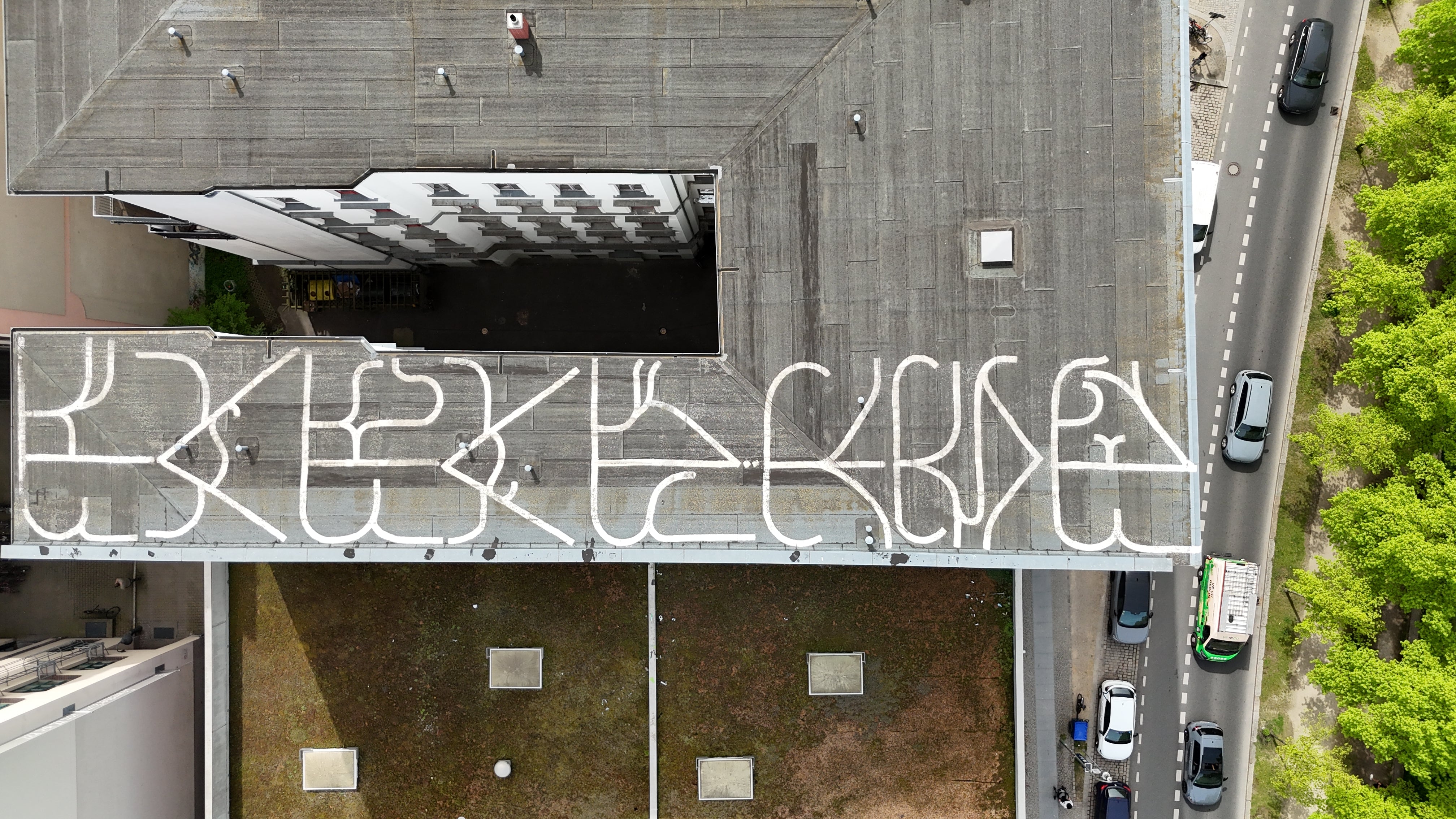 Group checking the live leaderboard near the Spree on a City Hunt Berlin