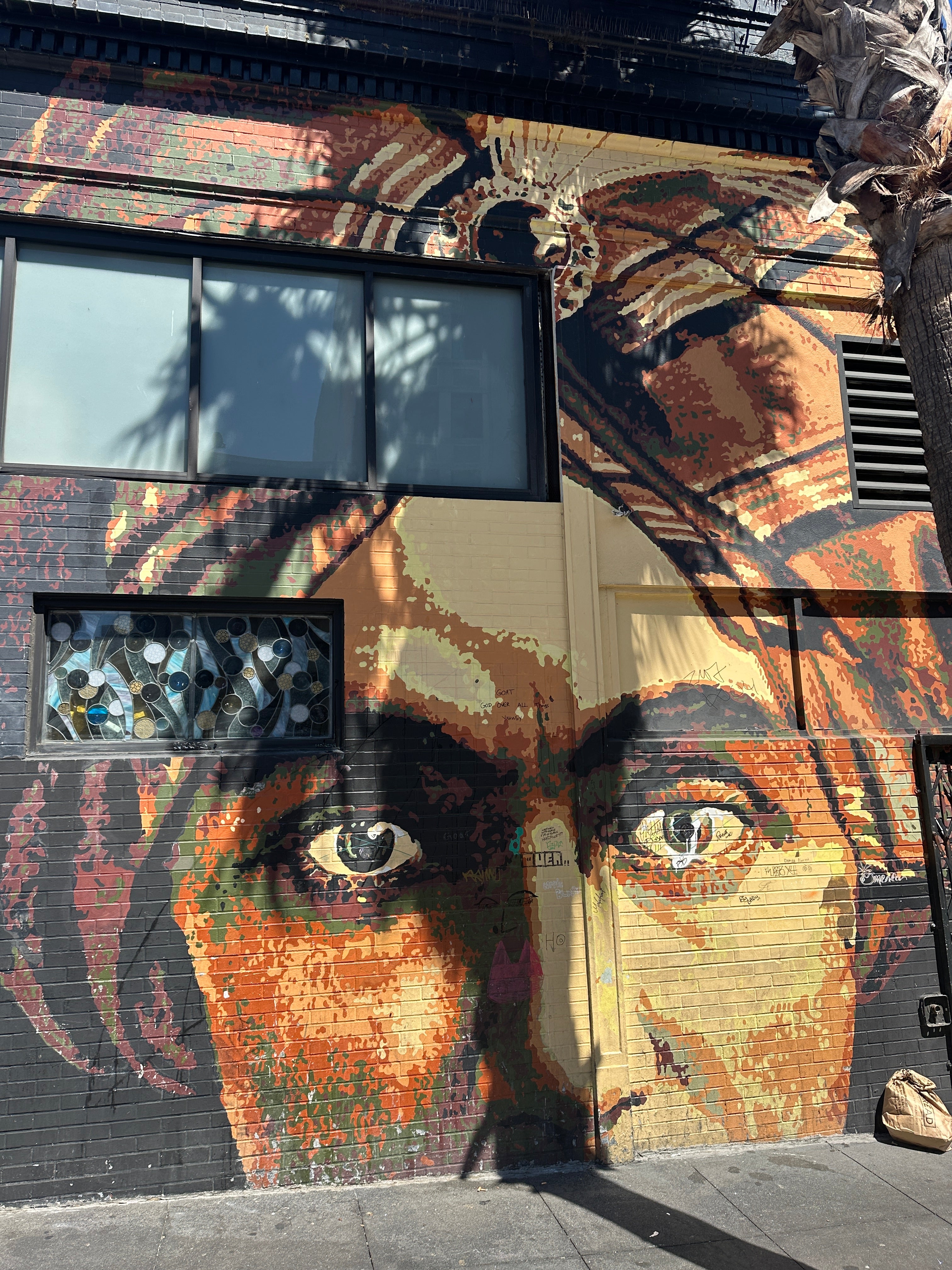 Class Trip San Francisco Street Art Tour — group photo by Clarion Alley murals