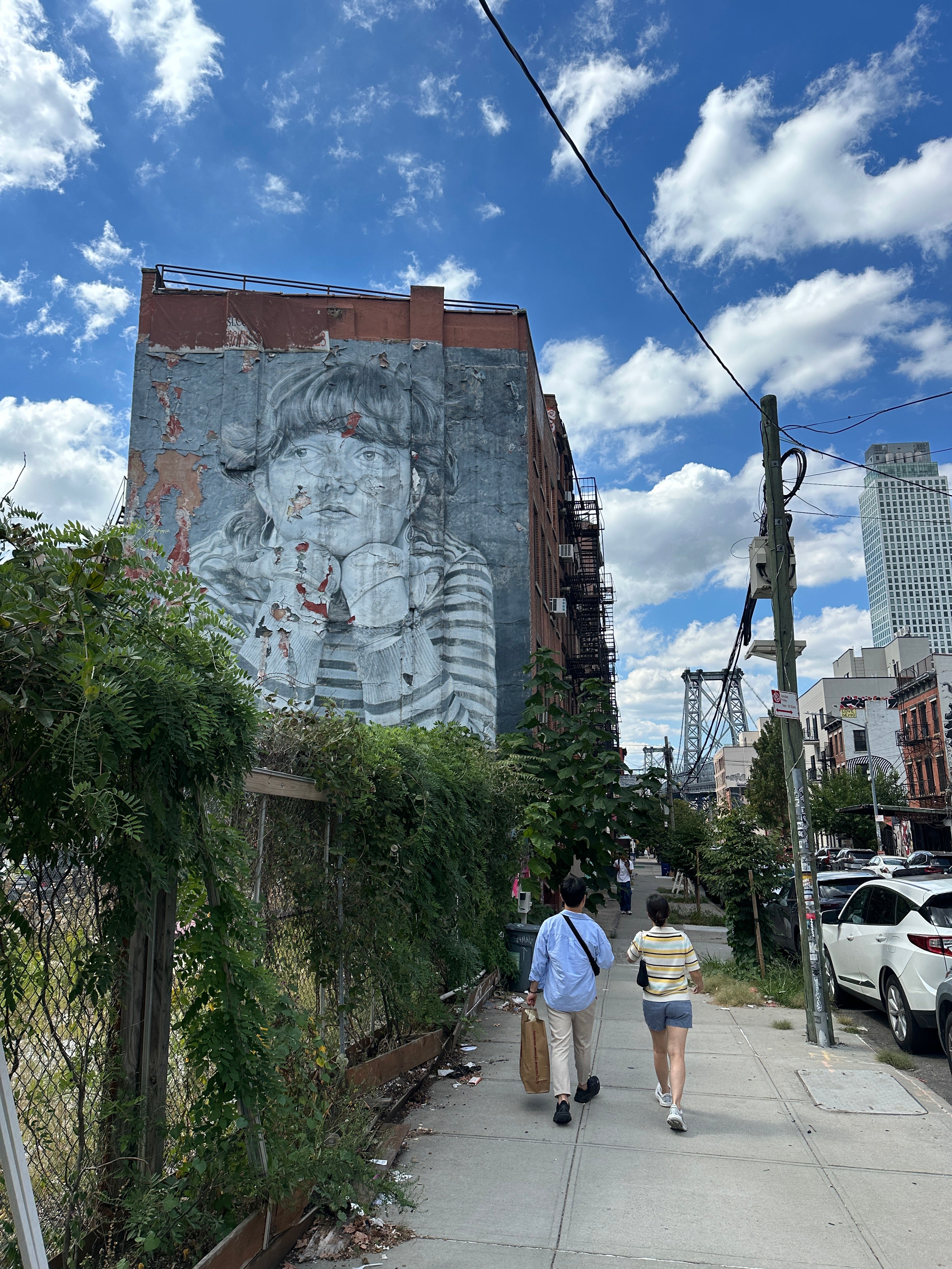 Shepard Fairey piece used as a photo backdrop on the Street Art Tour New York