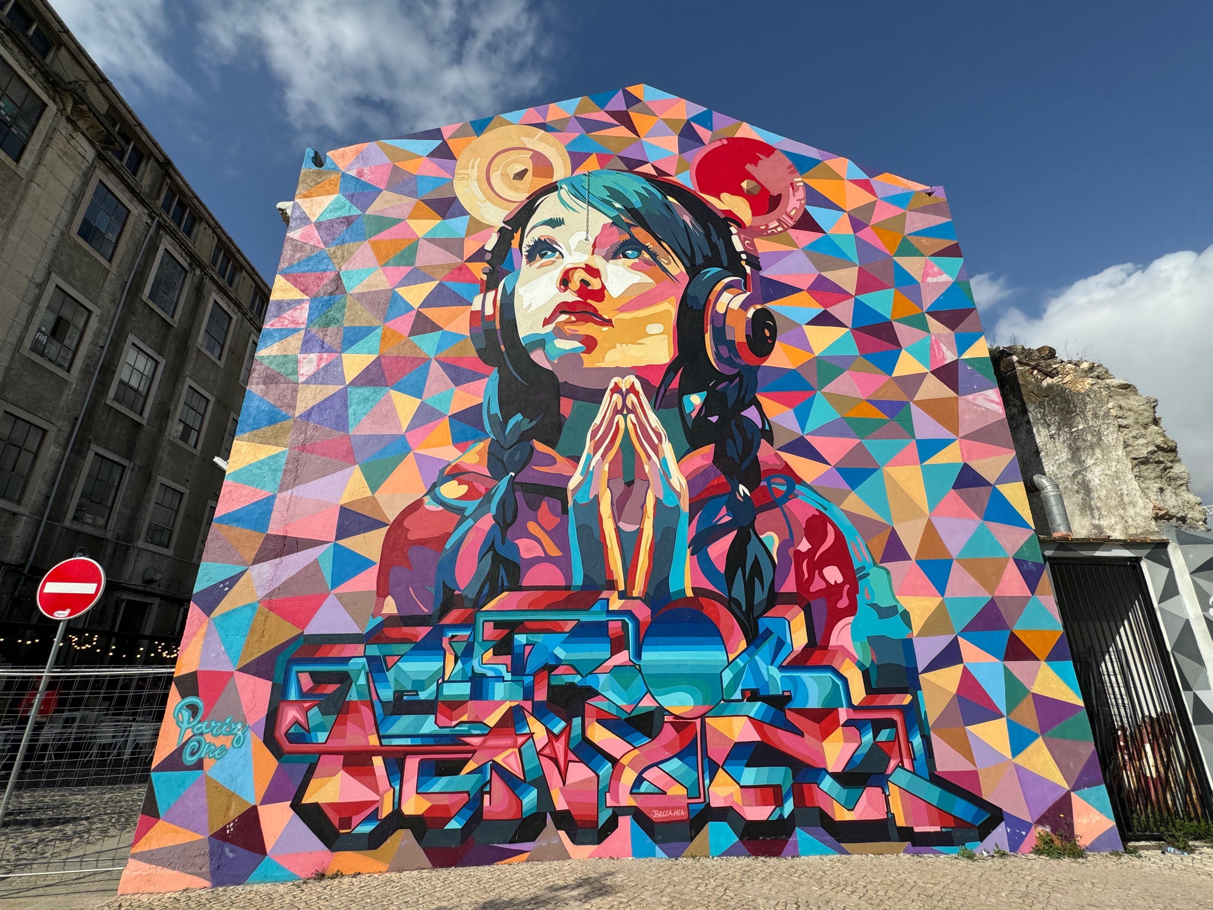 Lisbon Team Building Street Art Walk – team exploring the colorful walls of the LX Factory.