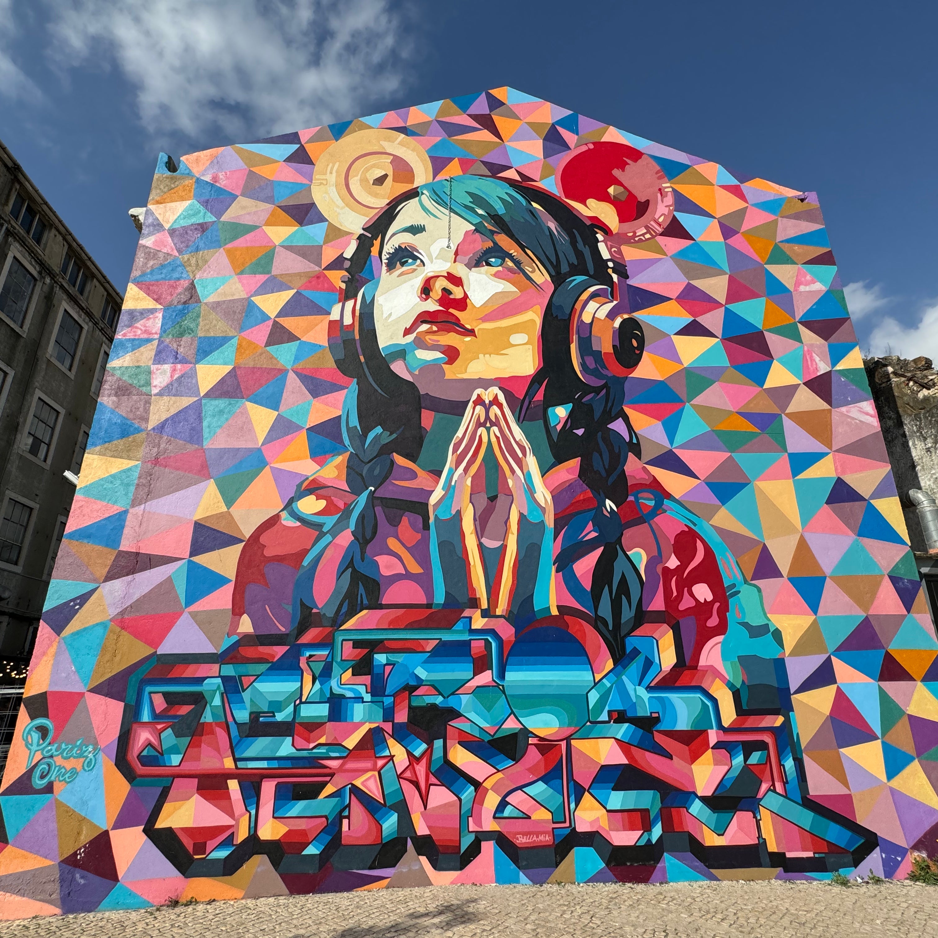 Color-blocked warehouse façade captured during the App-guided Street Art Tour Lisbon