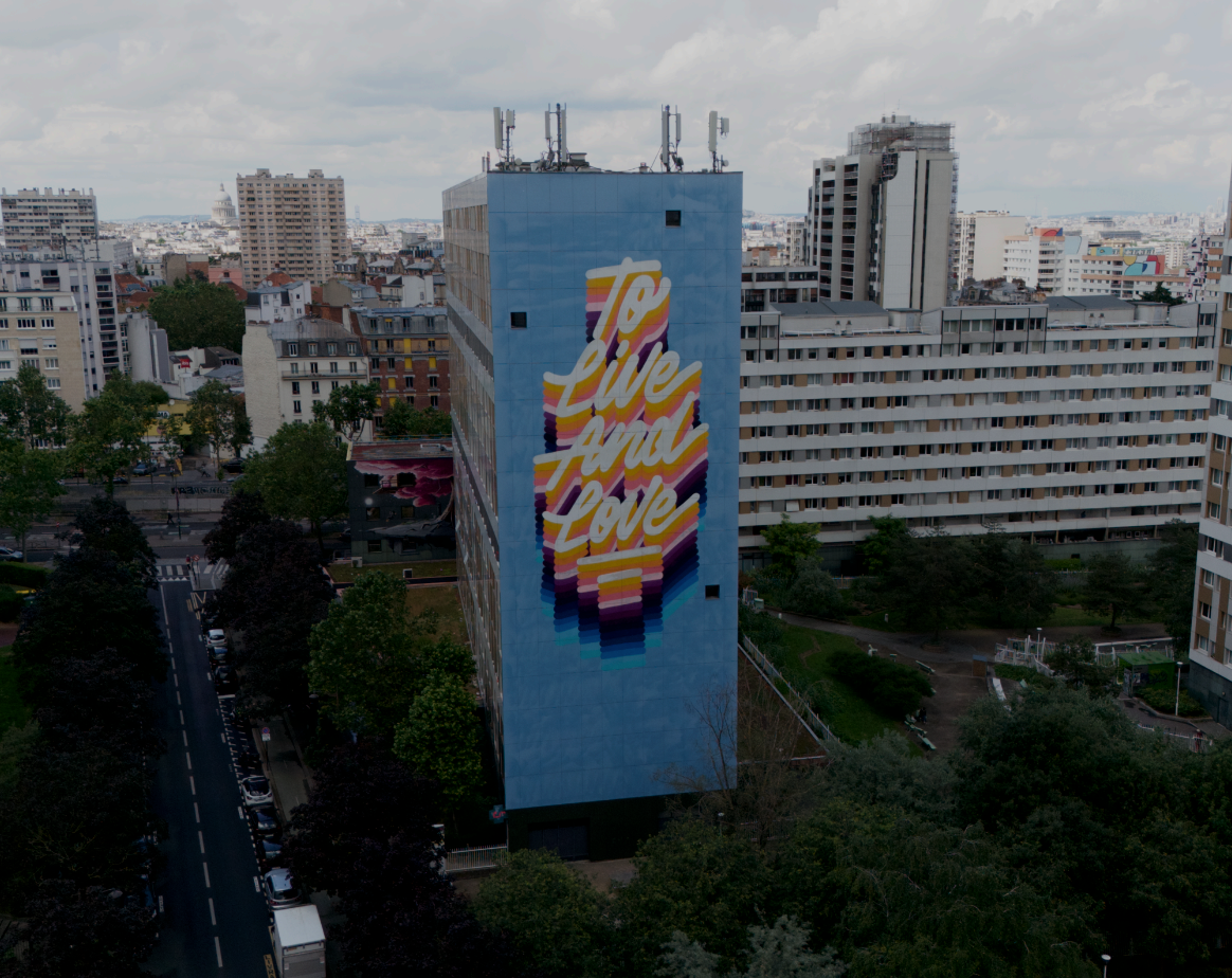 Creative team discovering Invader mosaics on the Paris Team Building Street Art Walk