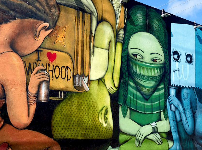 Team selfie at a colorful wall during the Street Art Tour Miami city walk