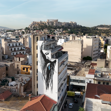 Class Trip Athens Street Art Tour — group photo with mural backdrop near Sarri Street
