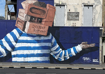 Dublin Team Building Street Art Walk — coworkers capturing urban details on Capel Street