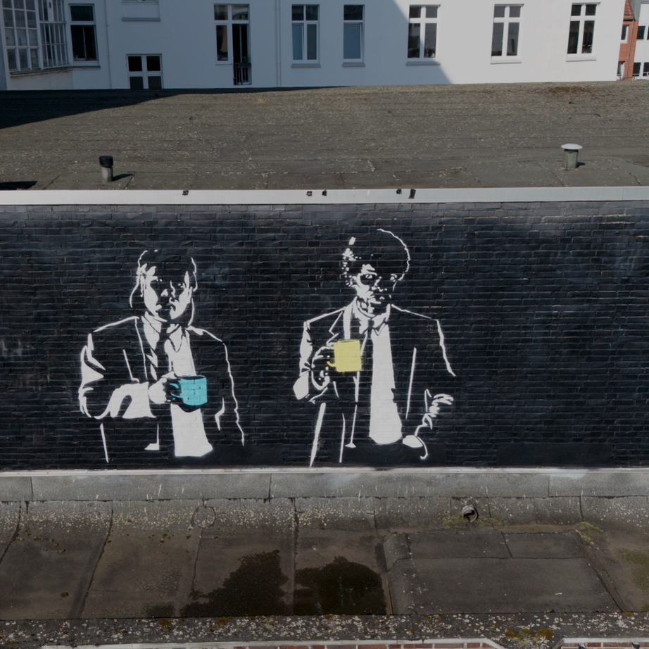 Close-up of layered posters near Glocksee on the Street Art Tour Hanover route