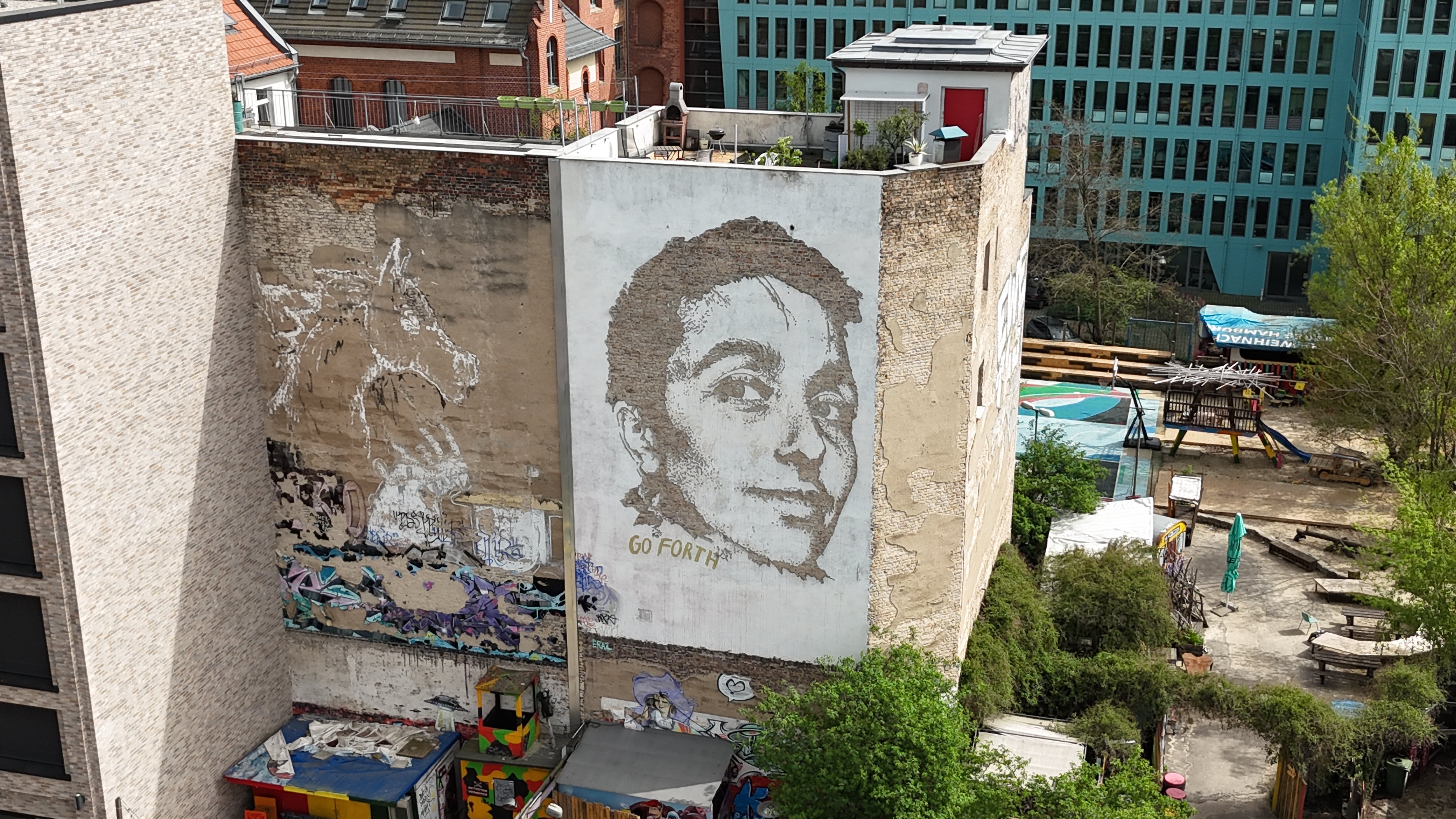 Close-up of a Vhils chiseled portrait on the Street Art Tour Berlin route
