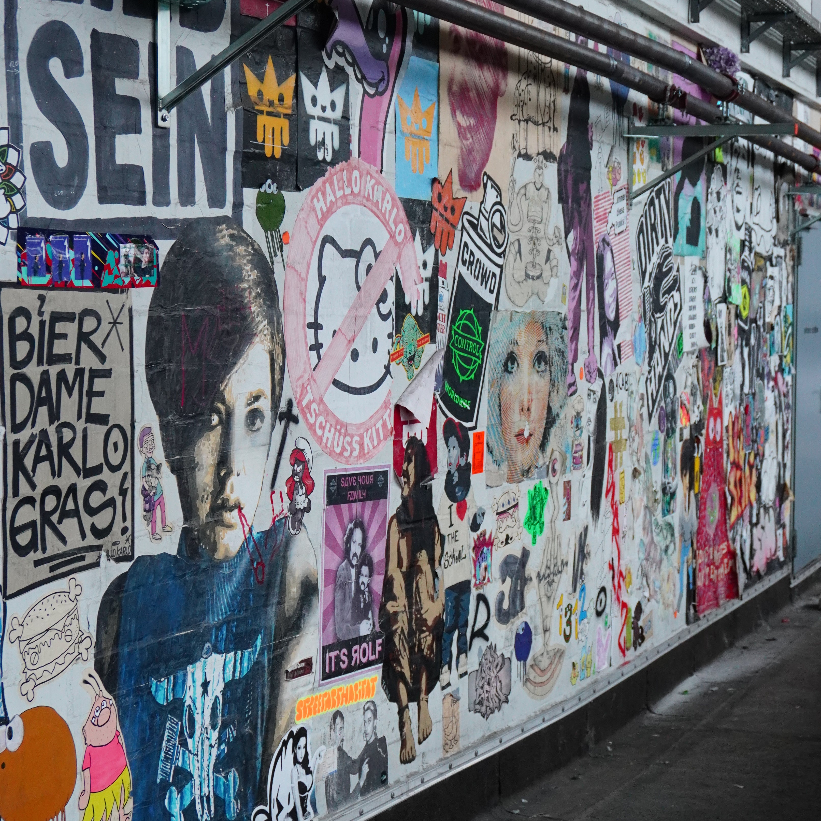 Paste-ups and stickers in the Karoviertel captured on a Street Art Walk Hamburg