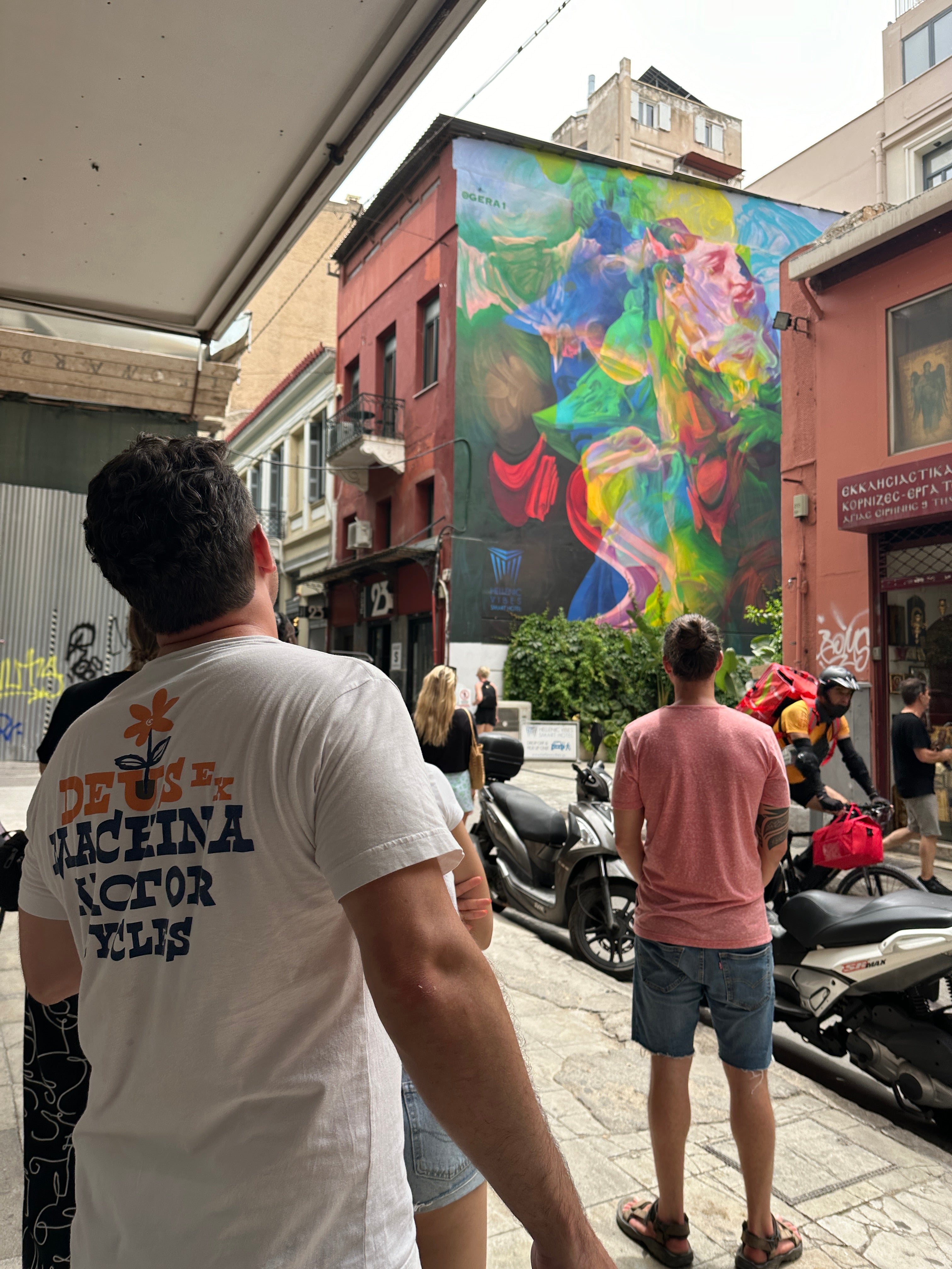 Team selfie near Plateia Iroon during an Interactive Street Art Tour Athens
