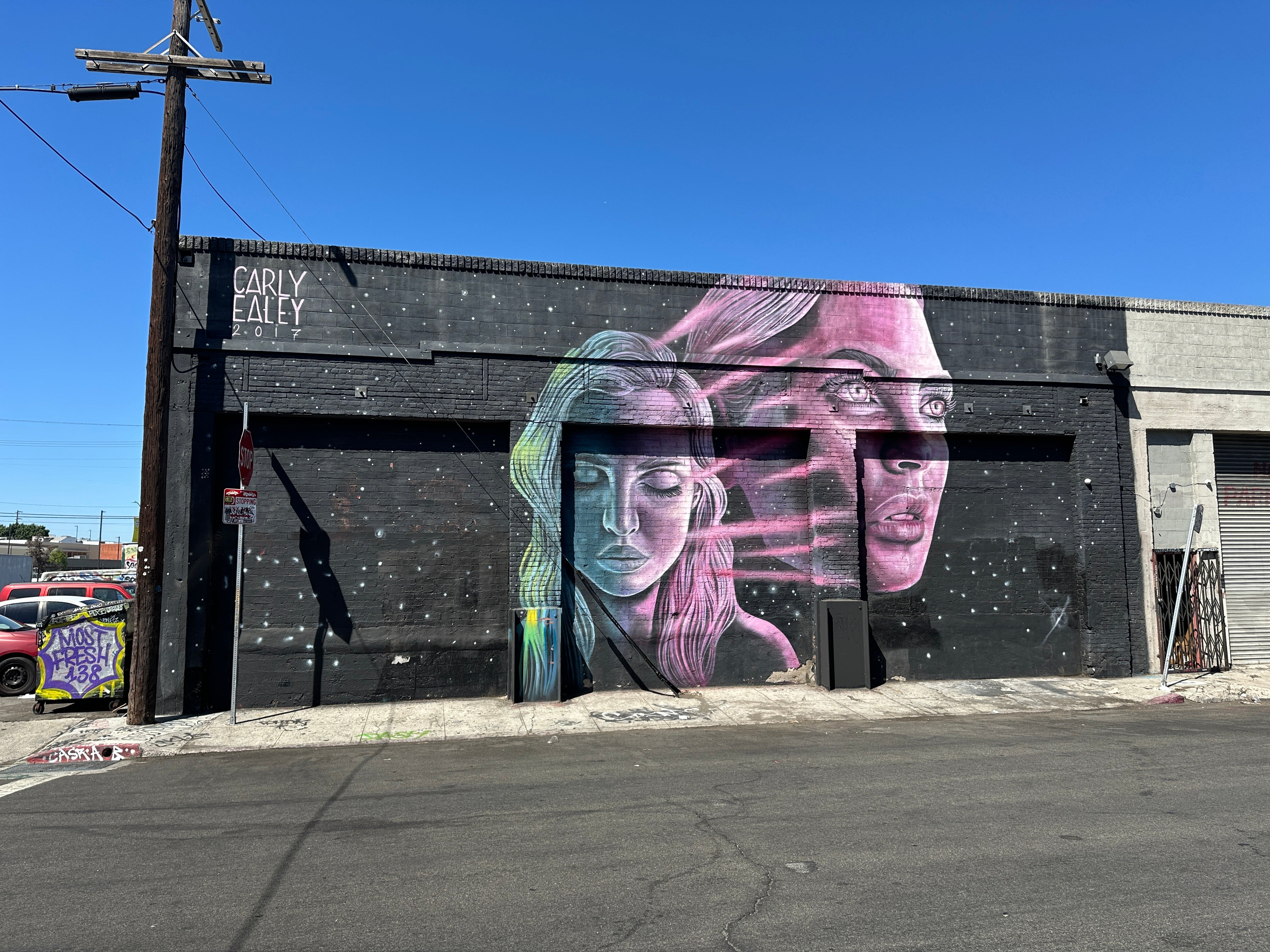 Participants using the Street Art Game app on the Street Art Tour Los Angeles near Little Tokyo.