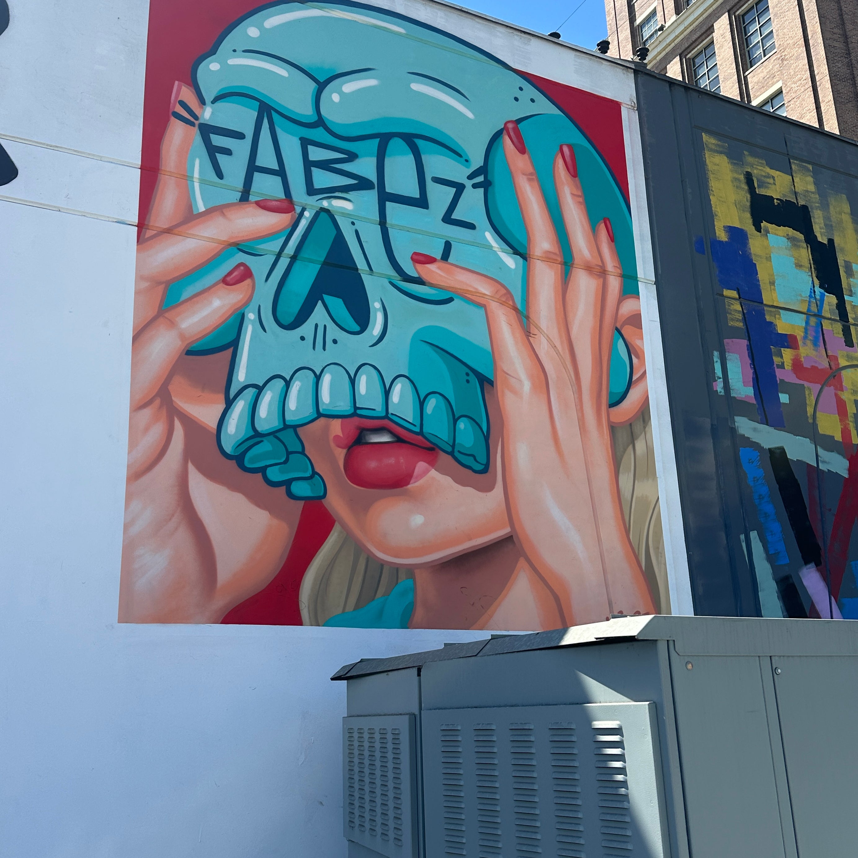 Friends exploring murals in the Arts District on the Street Art Tour Los Angeles