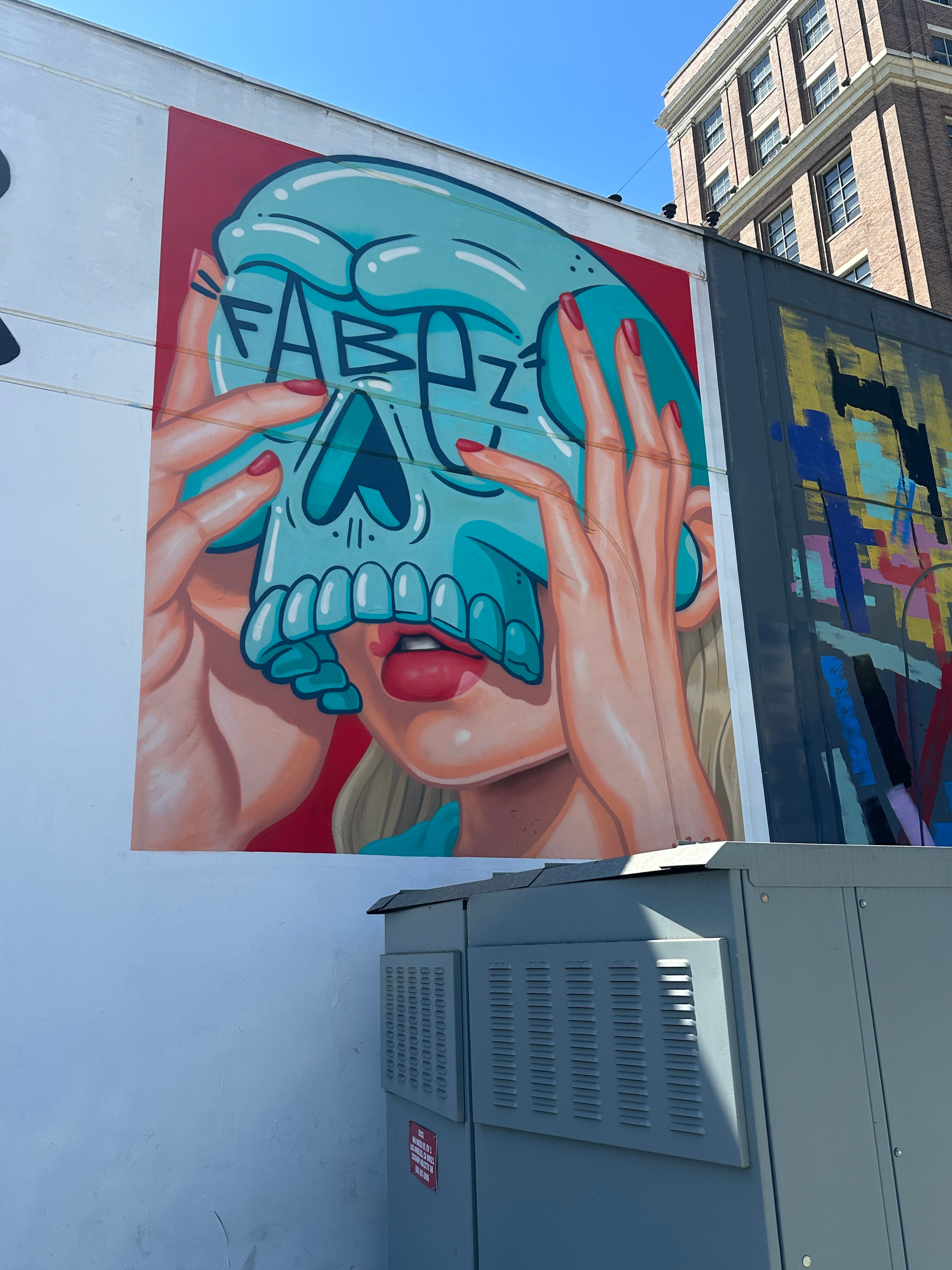 Friends exploring murals in the Arts District on the Street Art Tour Los Angeles