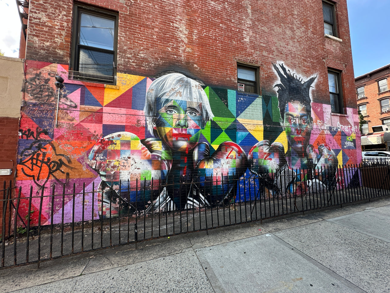Street Art Tour New York – colorful mural in Williamsburg with Basquiat and Warhol artwork