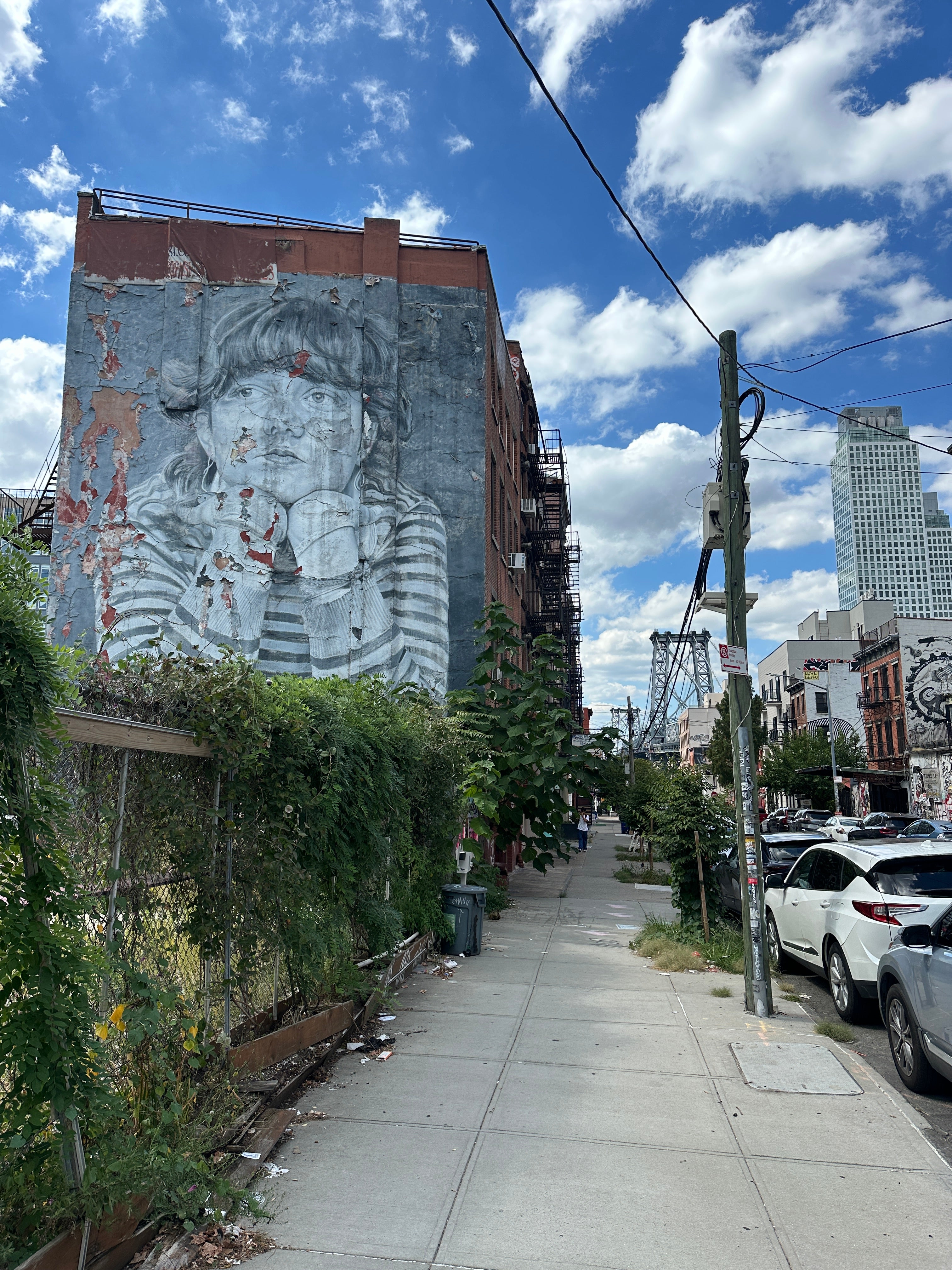 Creative group competing with the Street Art Game app on the New York Team Building Street Art Walk through Brooklyn’s mural scene.