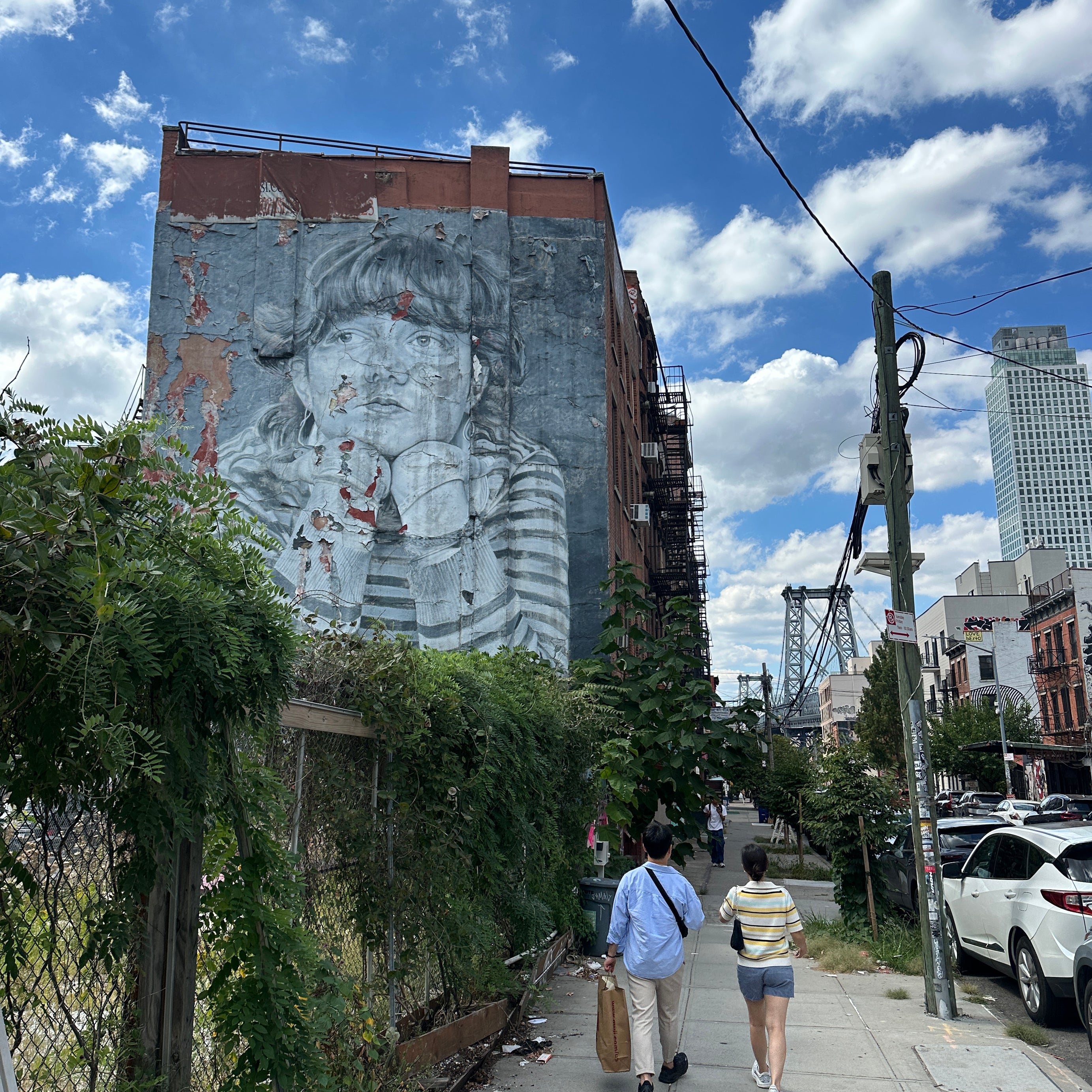 Shepard Fairey piece used as a photo backdrop on the Street Art Tour New York