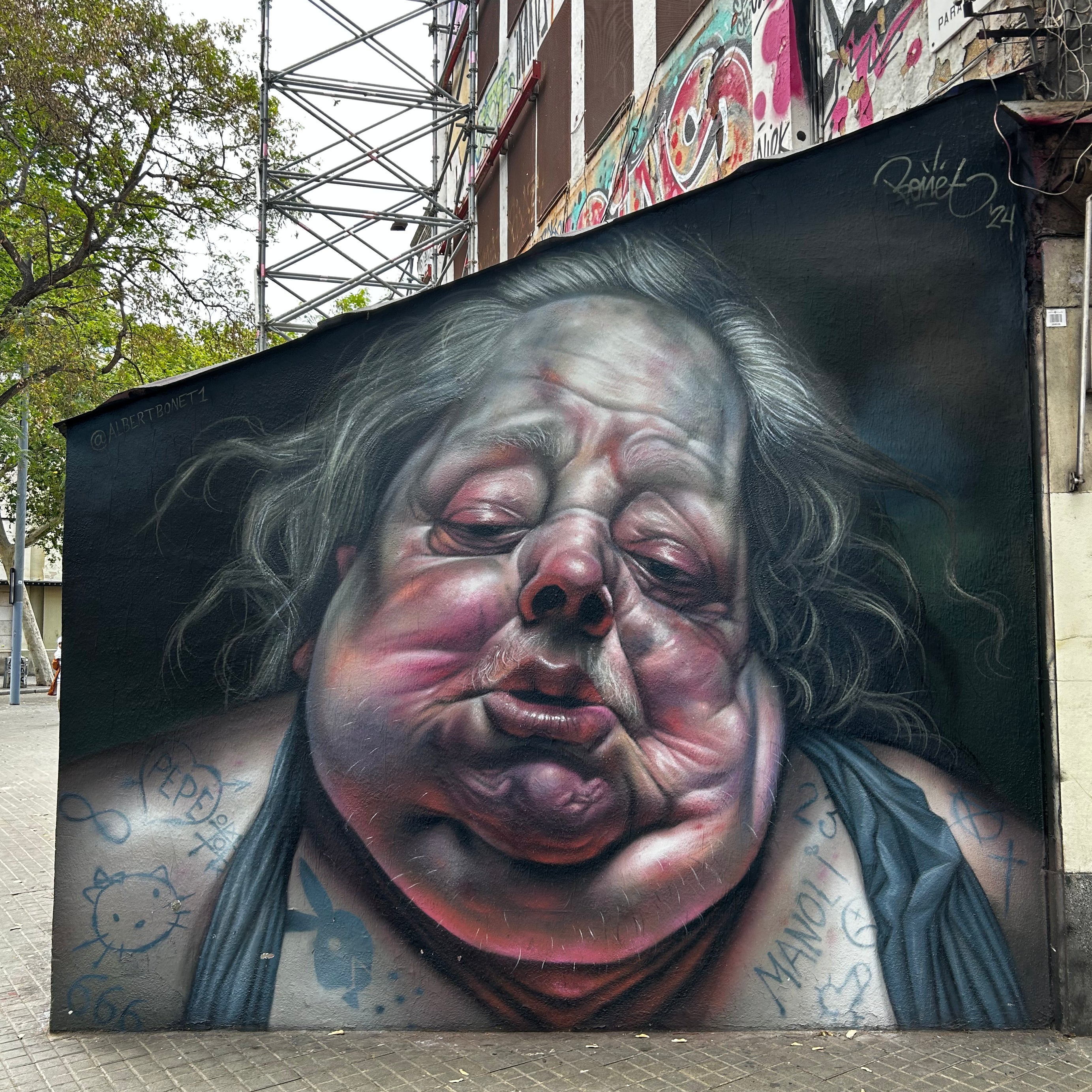 International team enjoying urban art on the Barcelona Team Building Street Art Walk