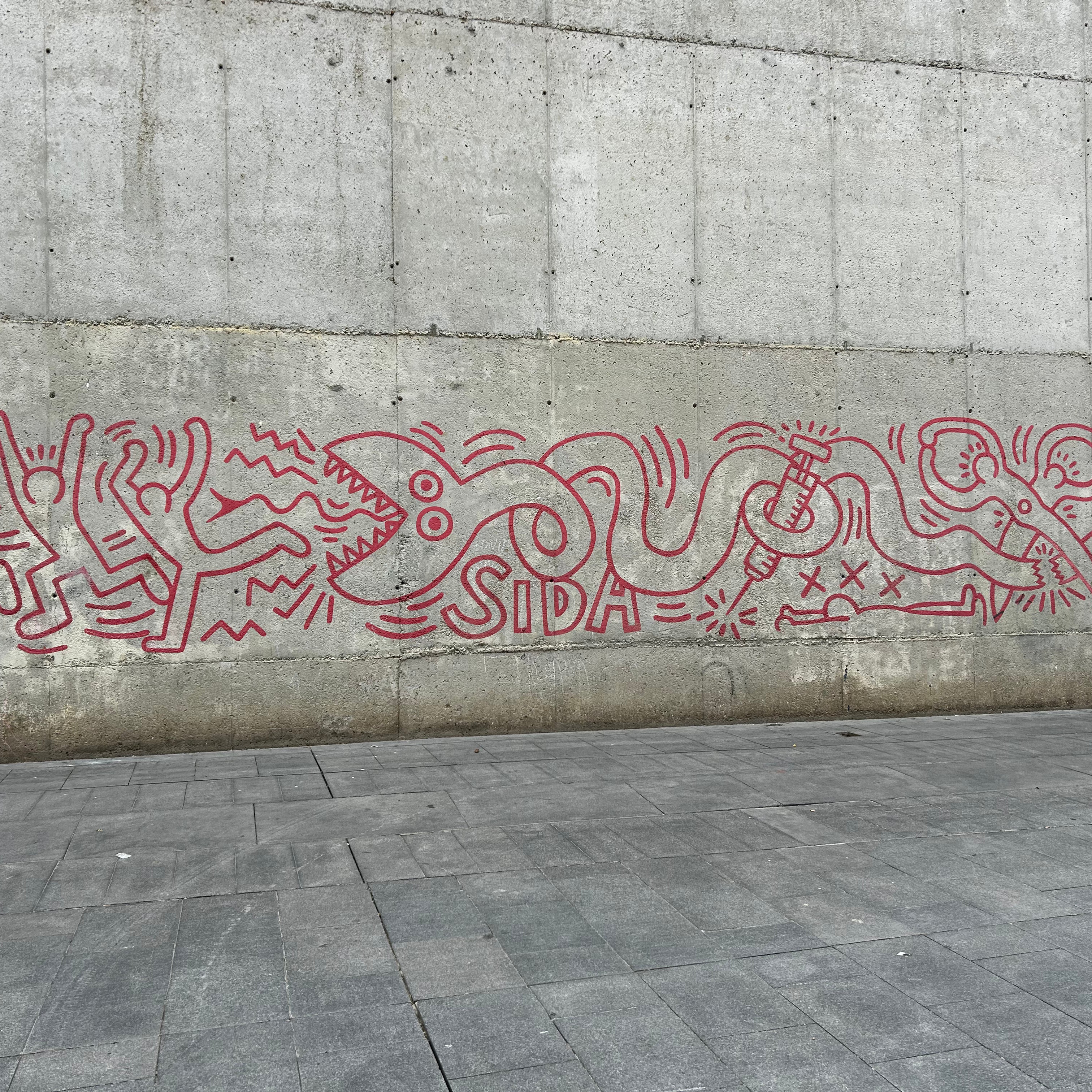 Close-up of the Keith Haring mural captured on the Street Art Tour Barcelona route