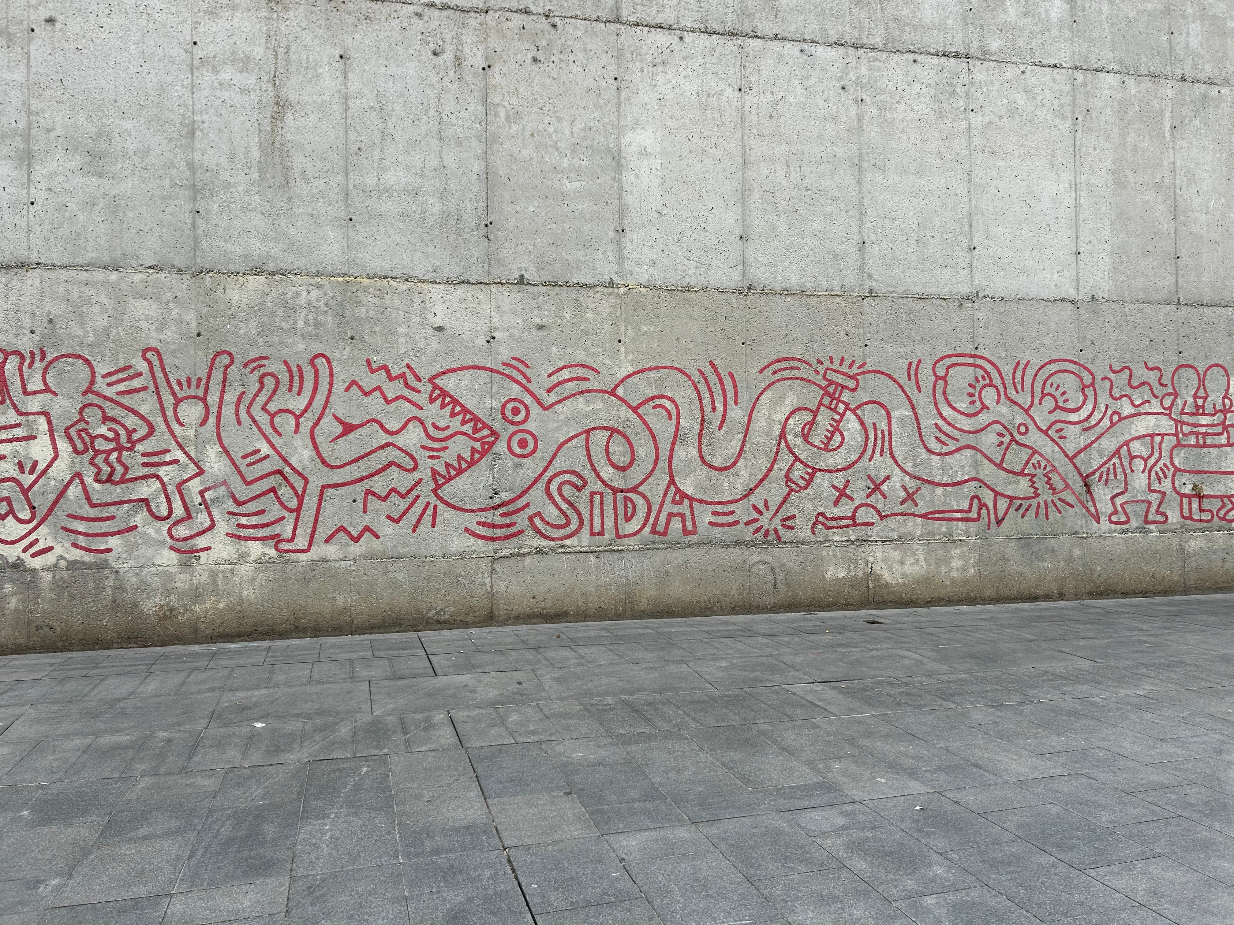 Close-up of the Keith Haring mural captured on the Street Art Tour Barcelona route